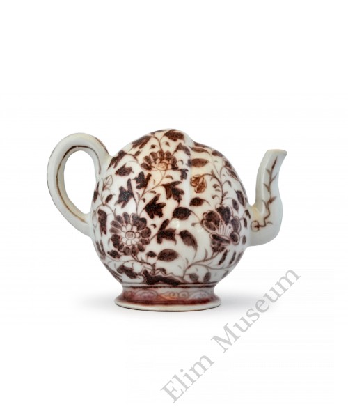 1428 An early Ming underglaze red peach  shape back-flow ewer